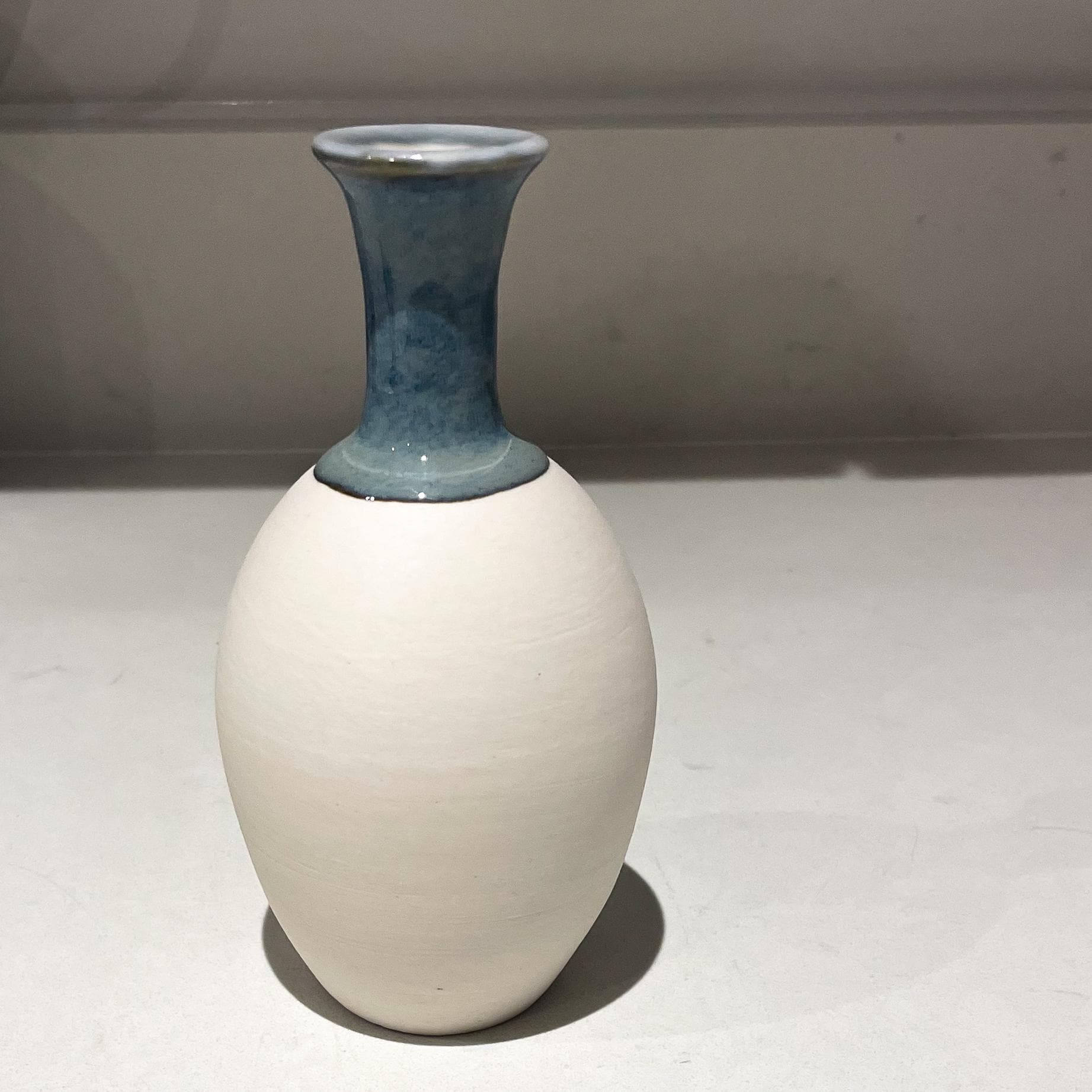 Handmade small Porcelain bud vase semi glazed